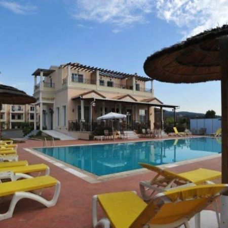 Thinalos Aparthotel Acharavi  Bagian luar foto